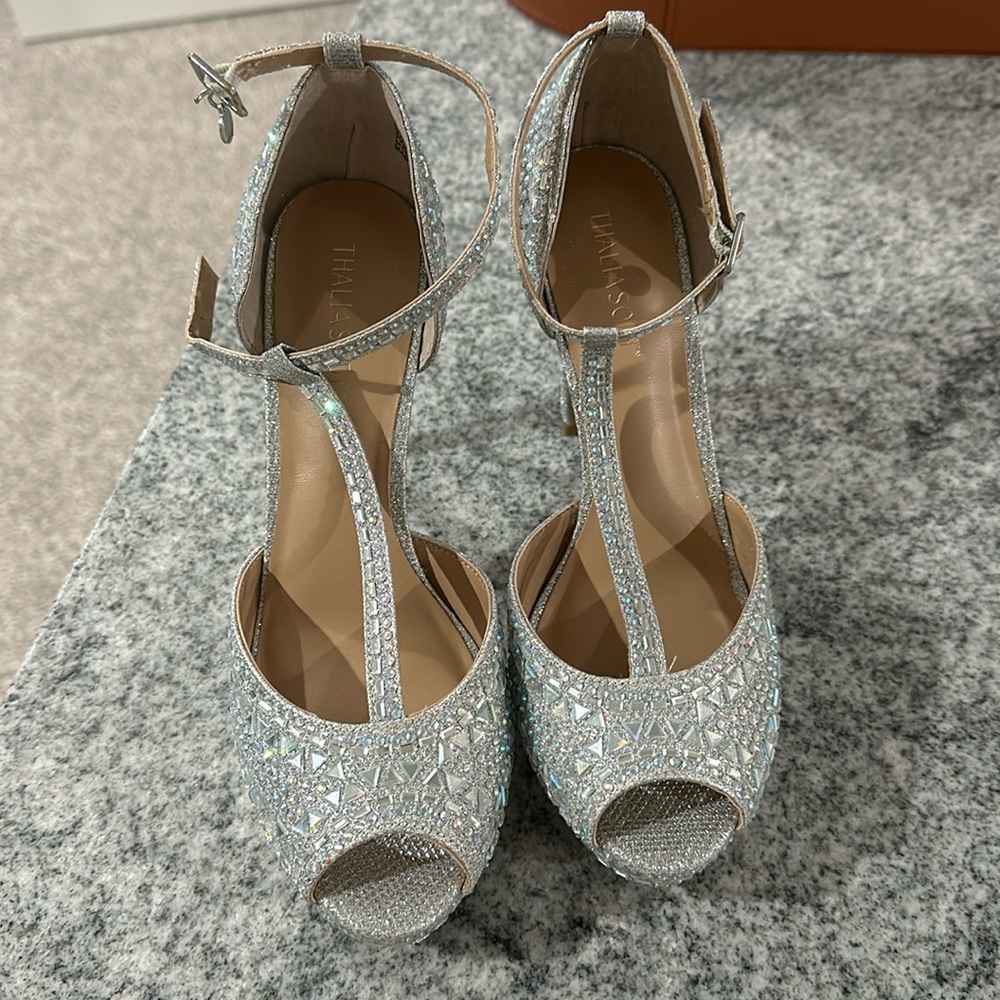 Never worn Thalia Sodi silver heels